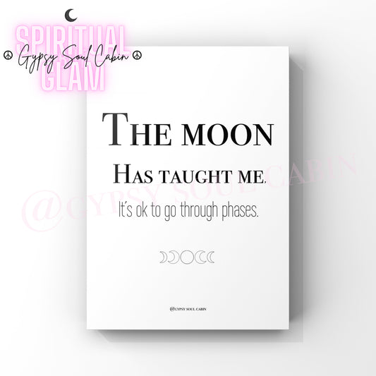 A black and white quote print with the text 'THE MOON HAS TAUGHT ME TO GO THROUGH PHASES' on a white background, with a graphic moon symbols at the end of the text.