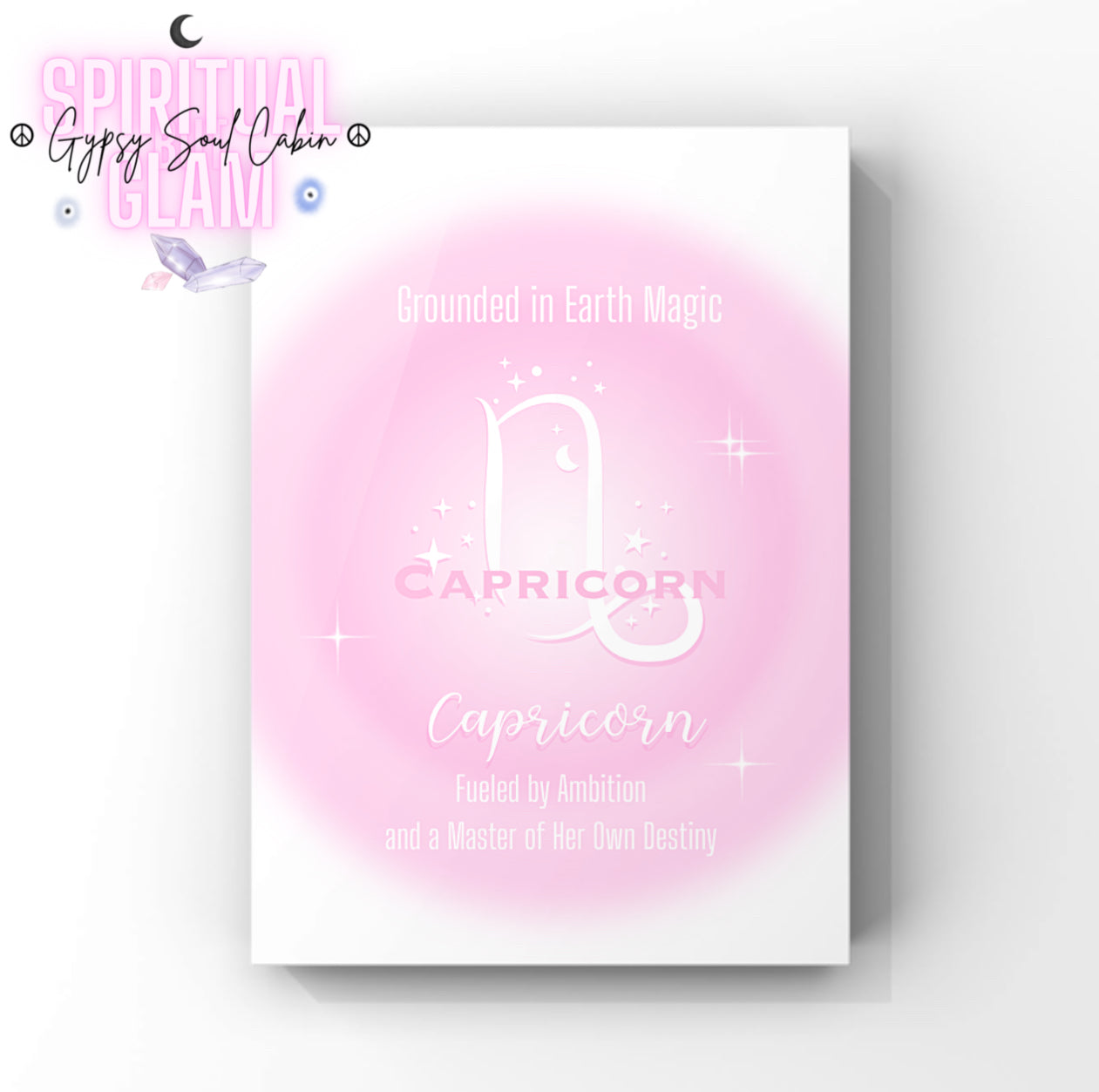 Minimalist A4 astrology wall art print featuring a soft pink aura background with a white Capricorn symbol and gothic typography reading Grounded in Earth Magic, Fueled by Ambition, and a Master of Her Own Destiny.