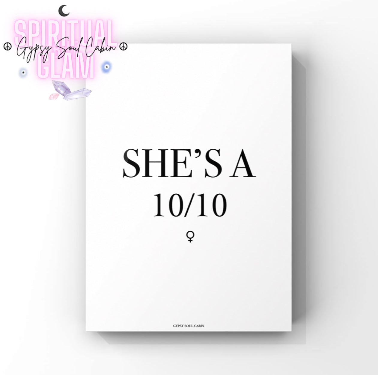 Minimalist black-and-white typography quote print featuring the text 'She's A 10/10,' with a small female Venus symbol detail for an empress bedroom theme.