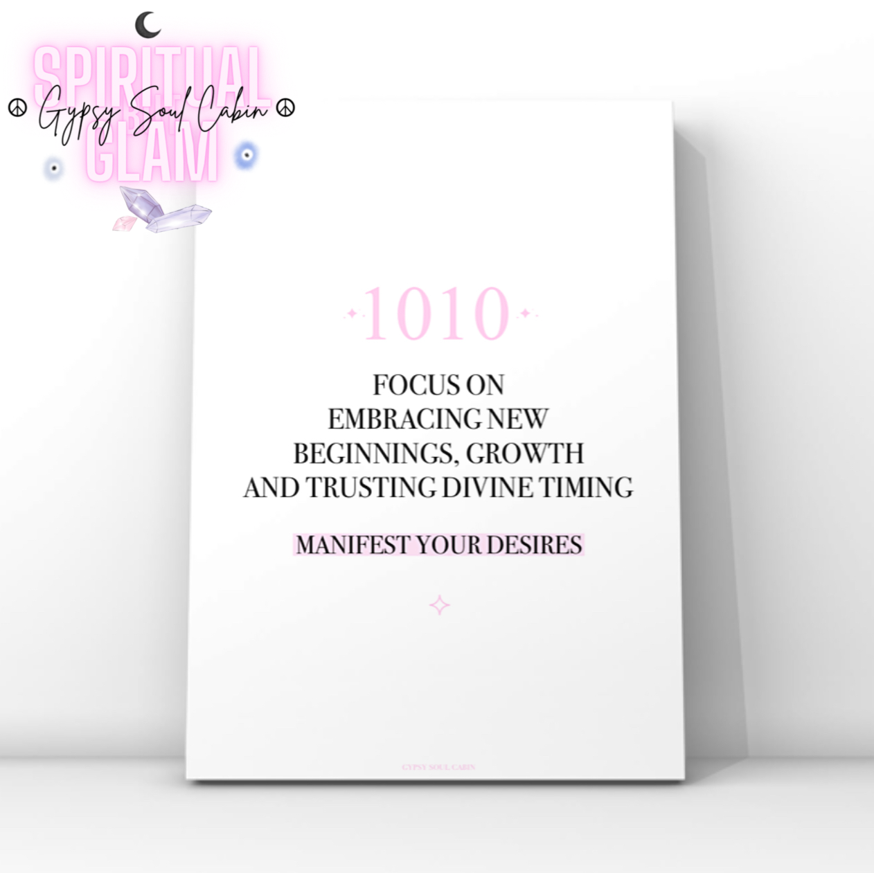 Minimalist typography print featuring a pink 1010 angel number and a pastel pink background highlight behind the words Manifest Your Desires.
