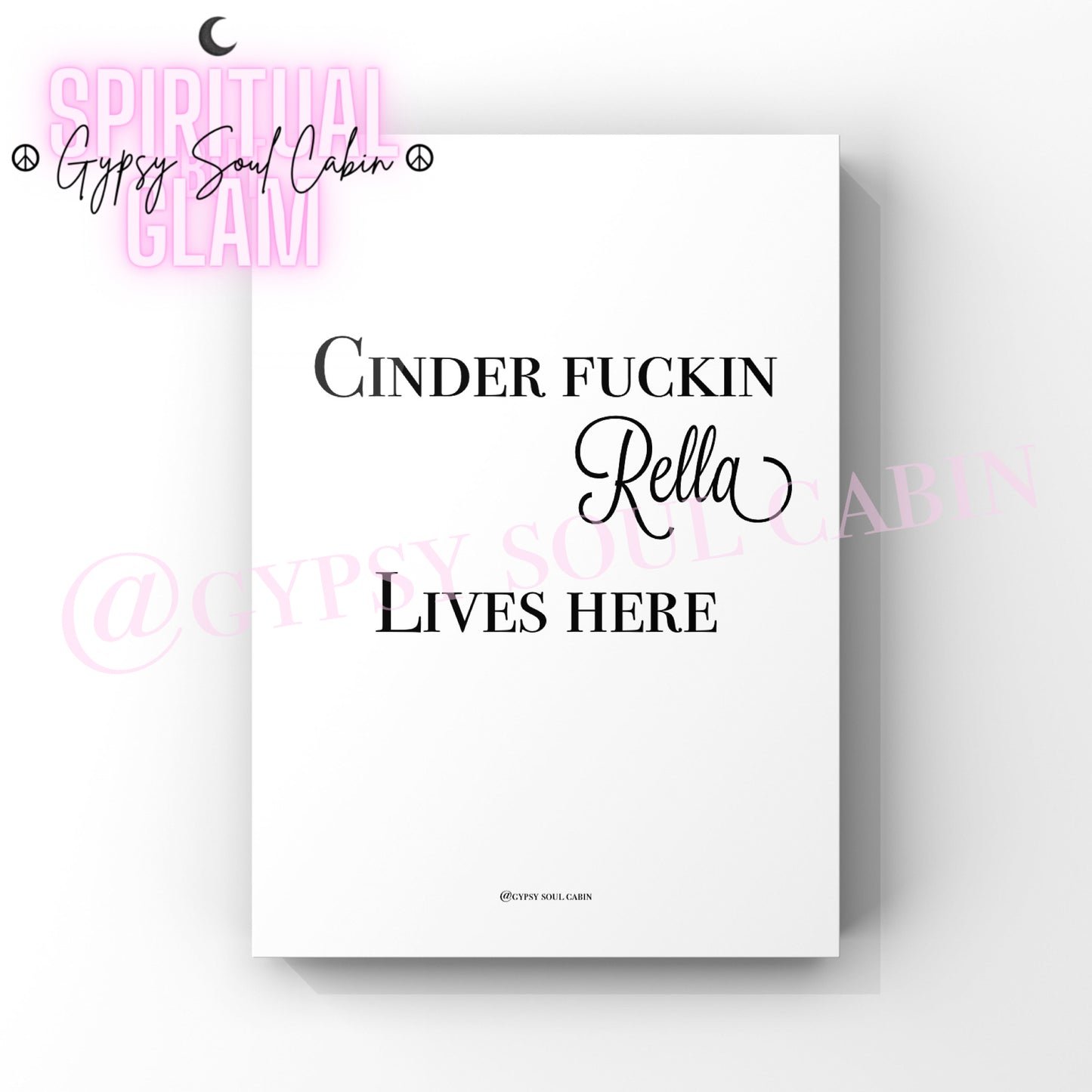 Black and white wall print with the text 'CINDER FUCKIN RELLA LIVES HERE' in bold black serif and cursive fonts, designed as humorous and bold home decor.