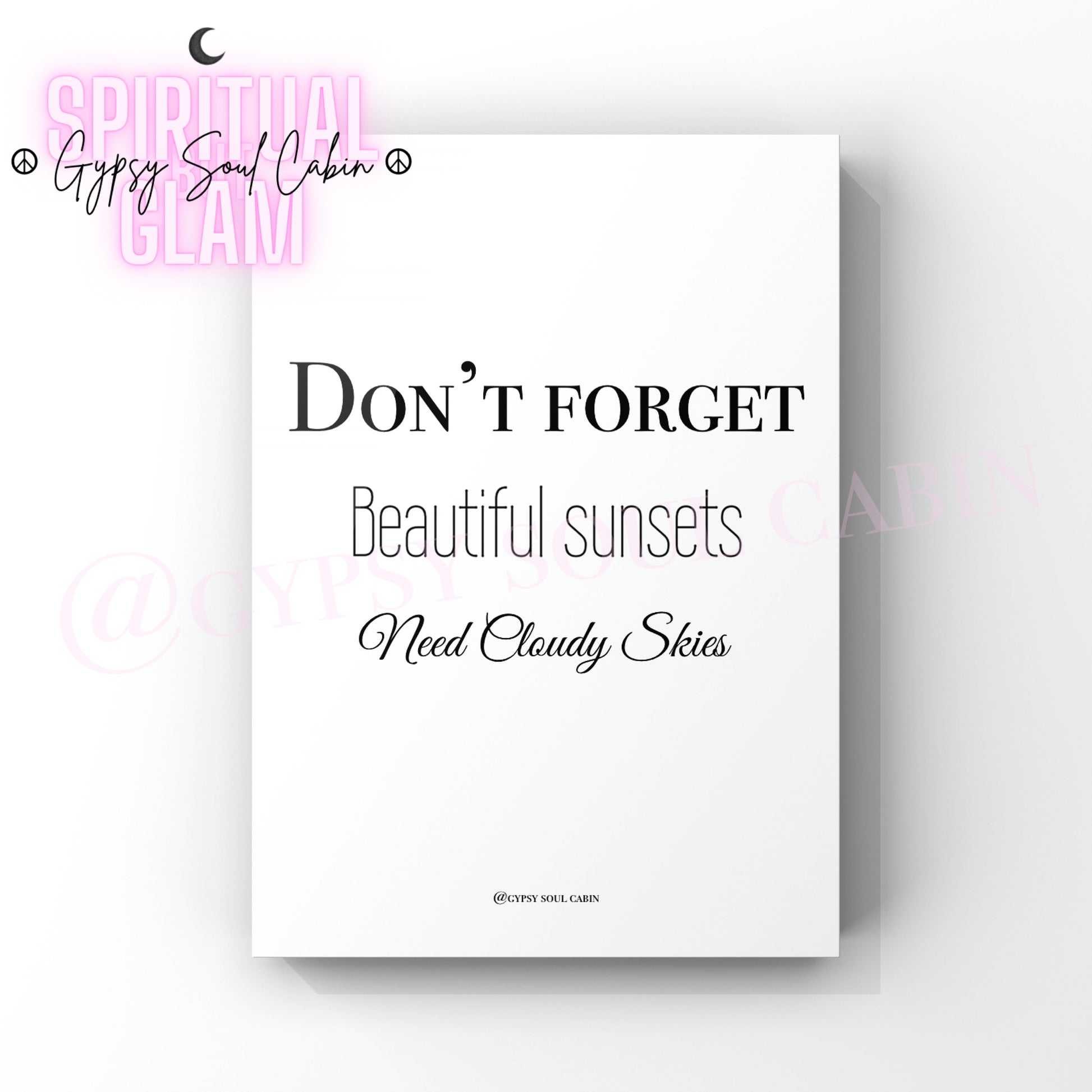 A black and white quote print with the text 'DON'T FORGET BEAUTIFUL SUNSETS NEED CLOUDY SKIES' on a white background.