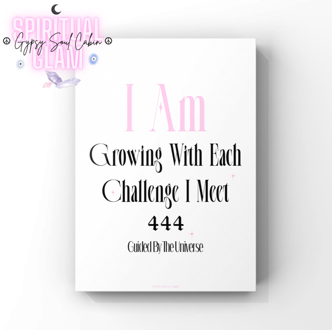 Minimalist A4 divine feminine typography print with pink text reading I Am, bold black lettering reading Growing With Each Challenge I Meet, the gothic angel number 444, and tagline Guided By The Universe.