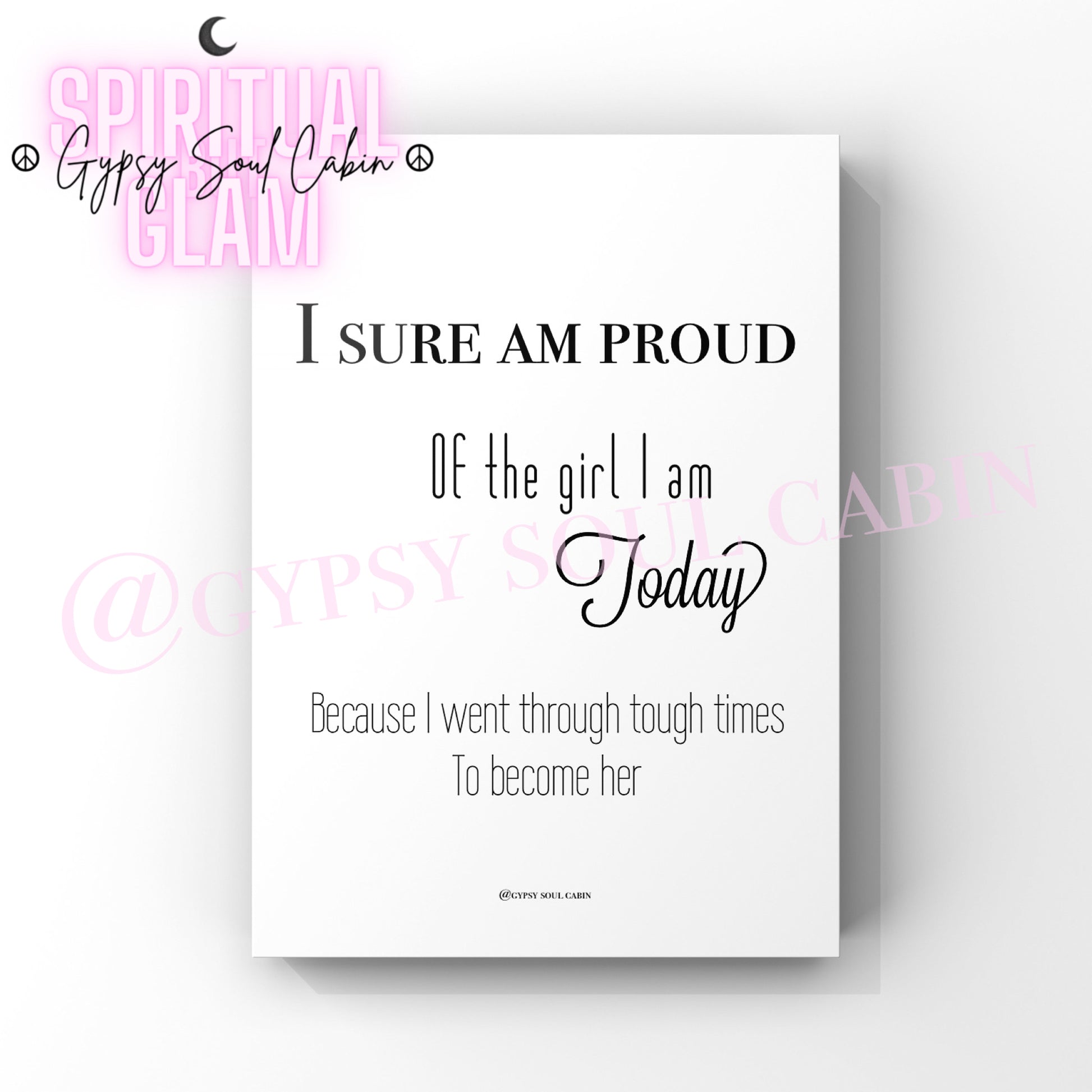 Black and white A4 quote print with the text 'I SURE AM PROUD of the girl I am today because I went through tough times to become her' in a mix of elegant fonts, designed as empowering wall decor.