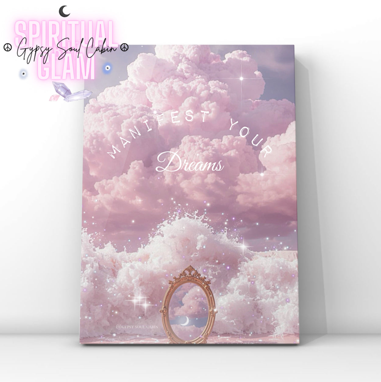 Inspirational wall print with pink clouds, a mirror, and the phrase 'Manifest Your Dreams' in white curved text, designed to motivate and inspire positive thinking.