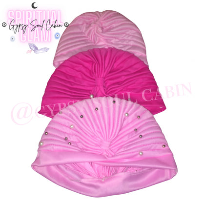 Three pink bohemian gypsy head wraps with a geometric pattern, featuring a band with pearl-like beads and a textured design.