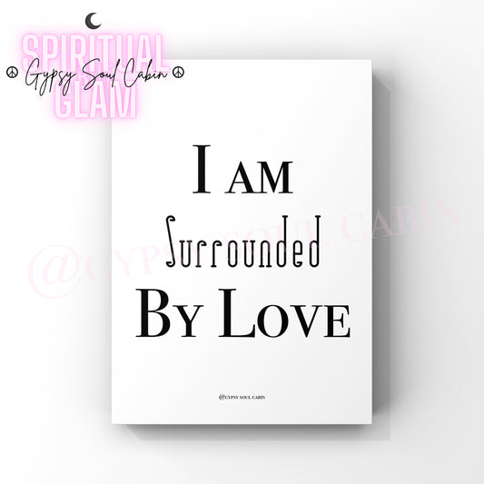 A black and white quote print with the text 'I AM SURROUNDED BY LOVE' on a white background, with a watermark 'Gypsy Soul Cabin' and 'Copyright' at the top.