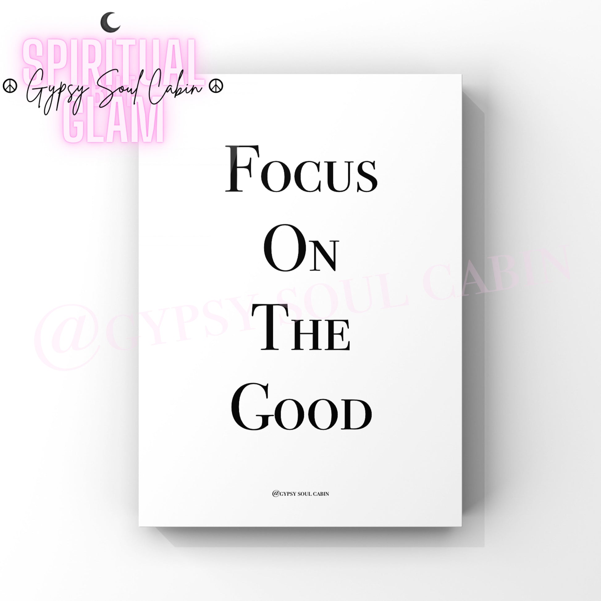 A black and white quote print with the text 'FOCUS ON THE GOOD' on a white background, with a watermark that says 'Gypsy Soul Cabin'.