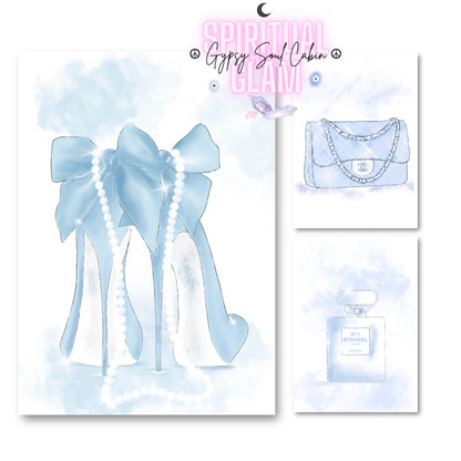 Elegant illustration poster set. Fashion heels with a large blue bow draped with a string of pearls, alongside a blue Chanel handbag and perfume bottle, set against a soft watercolour background.