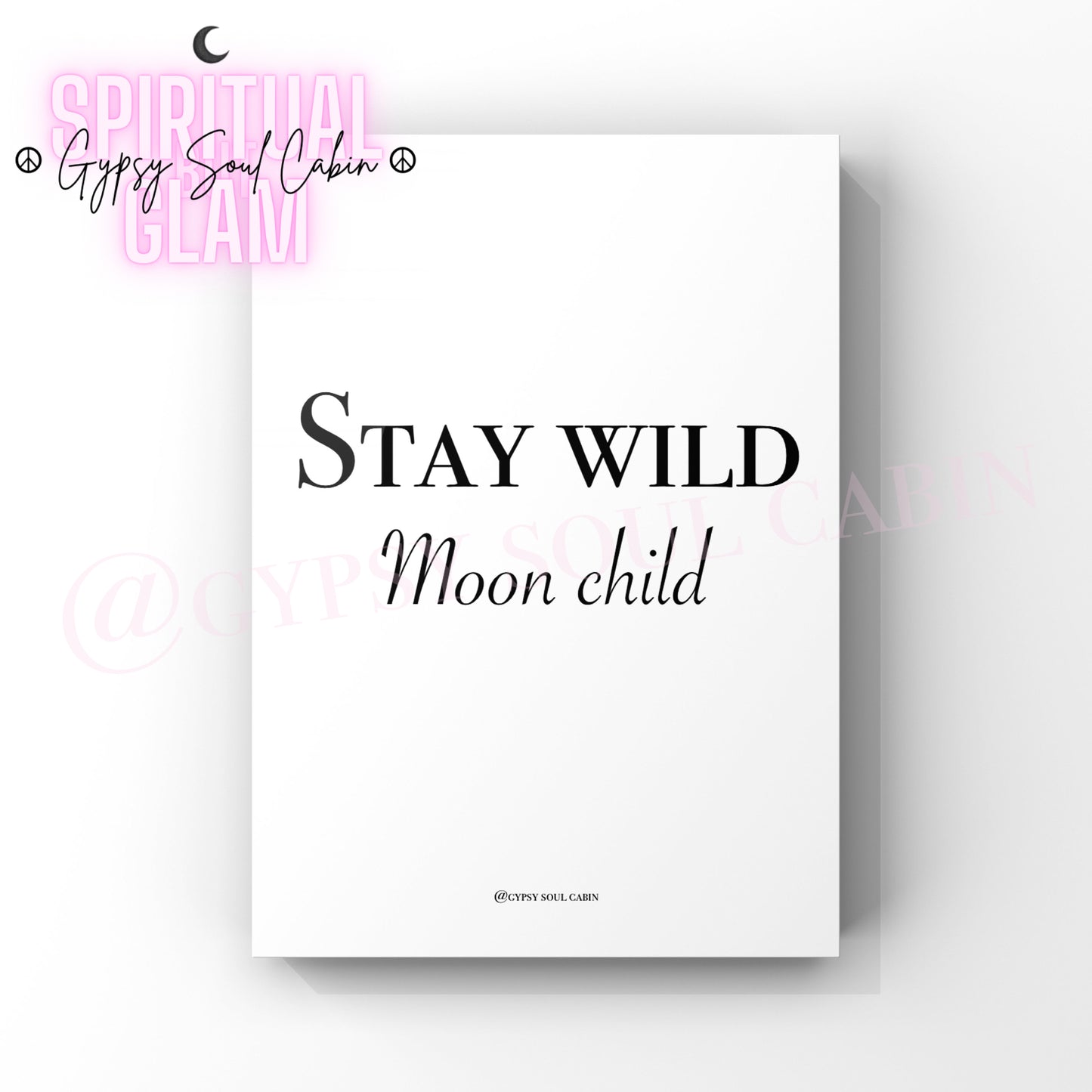 A black and white quote print with the text 'Stay Wild Moon Child' on a white background.