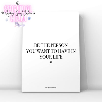 Clean minimalist typography print featuring the inspirational self-love quote "Be The Person You Want To Have In Your Life," with a small black heart icon underneath.