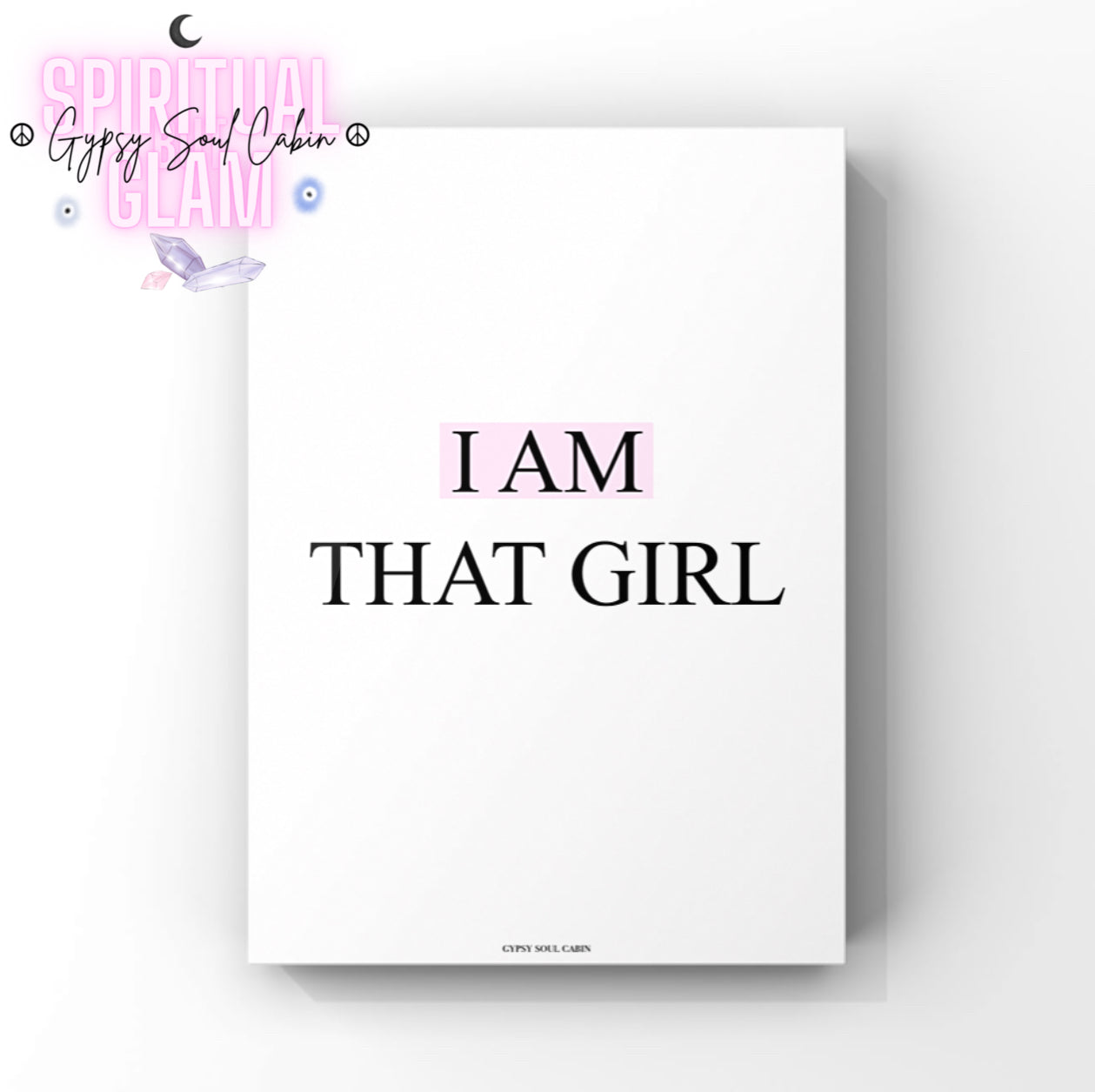 Minimalist white wall art print displaying black typography text stating I Am That Girl with a soft pink pastel highlight box covering the words I Am by Gypsy Soul Cabin.