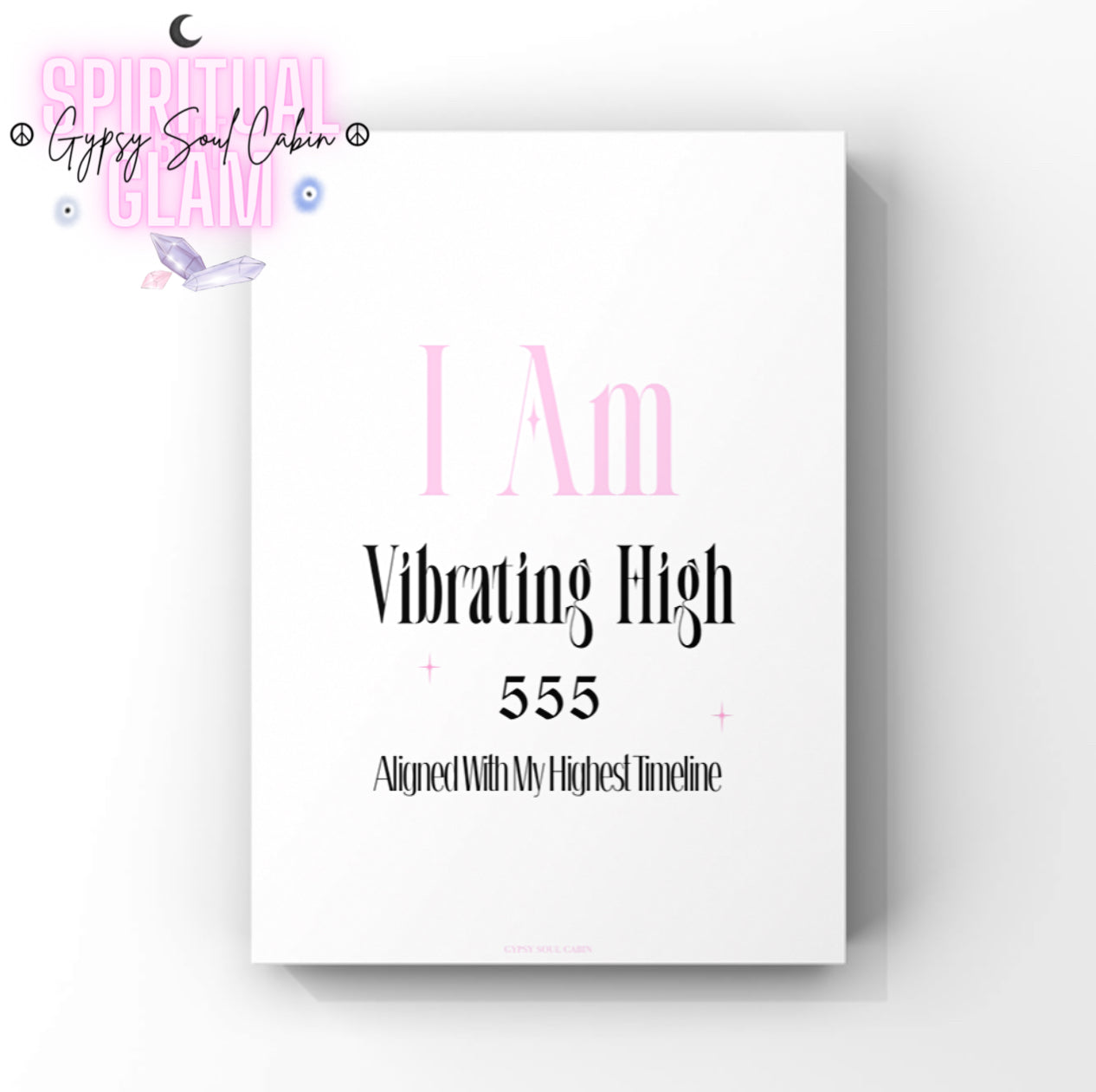 Minimalist A4 manifestation typography print with pink text reading I Am, bold black lettering reading Vibrating High, the gothic angel number 555, and the tagline Aligned With My Highest Timeline.