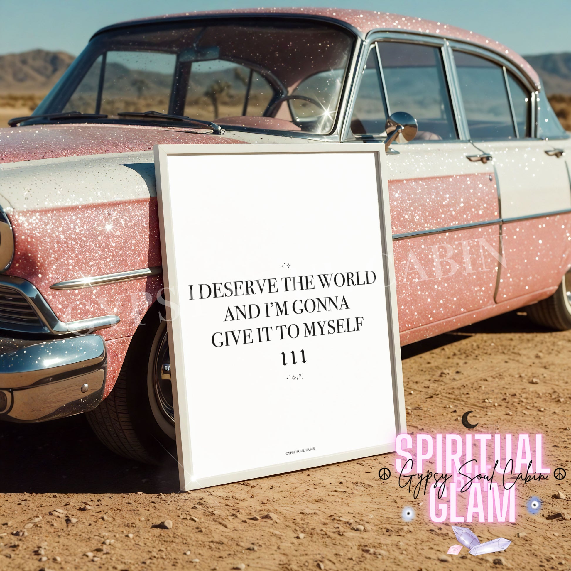 Minimalist typography wall art print in a white frame leaning against a glittery pink vintage car, reading I Deserve The World And I'm Gonna Give It To Myself 111.
