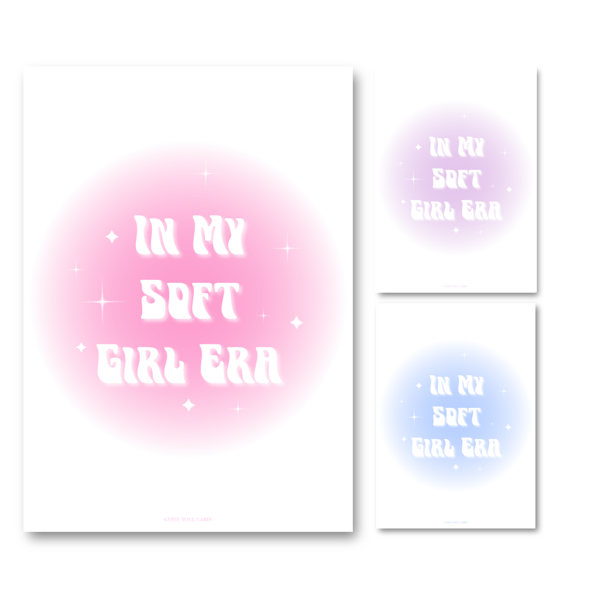 Gold-framed art prints leaning against a pink wall showcasing three colour options: pink, purple, and blue aura gradient glows with retro wavy text reading In My Soft Girl Era.