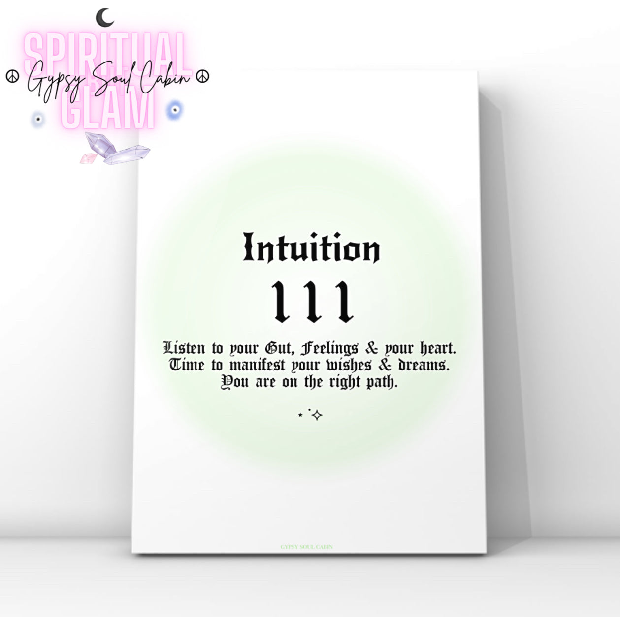 Minimalist A4 spiritual wall art print featuring a soft green aura gradient background with bold black gothic typography reading Intuition 111 and a manifestation guide text block.