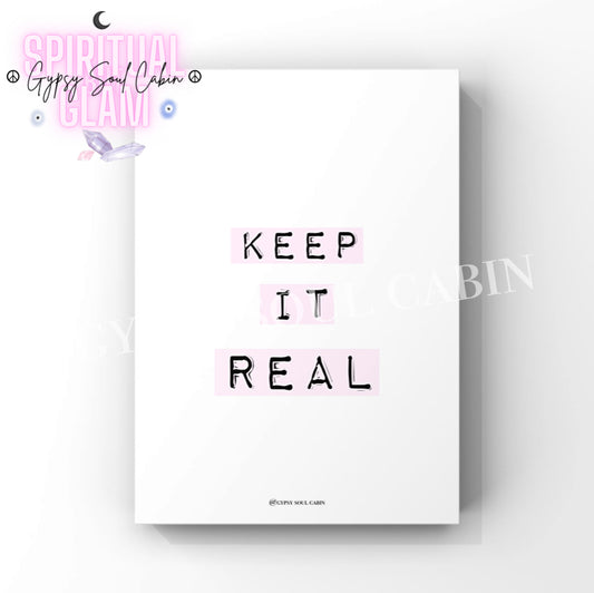 Minimalist typography art print featuring the motivational quote "Keep It Real" in typewriter font on light pink label-maker-style tape.