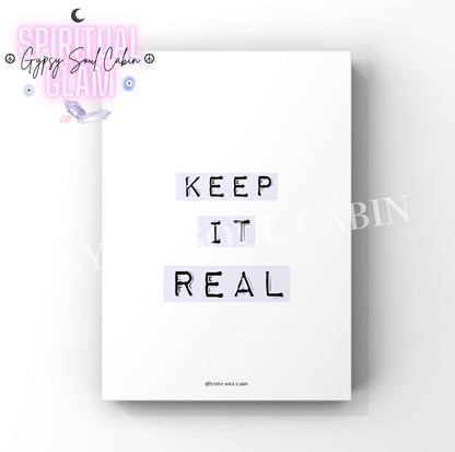 Aesthetic wall decor print featuring the quote “Keep It Real” styled as black Dymo label tape stickers in a pastel lilac purple colourway.