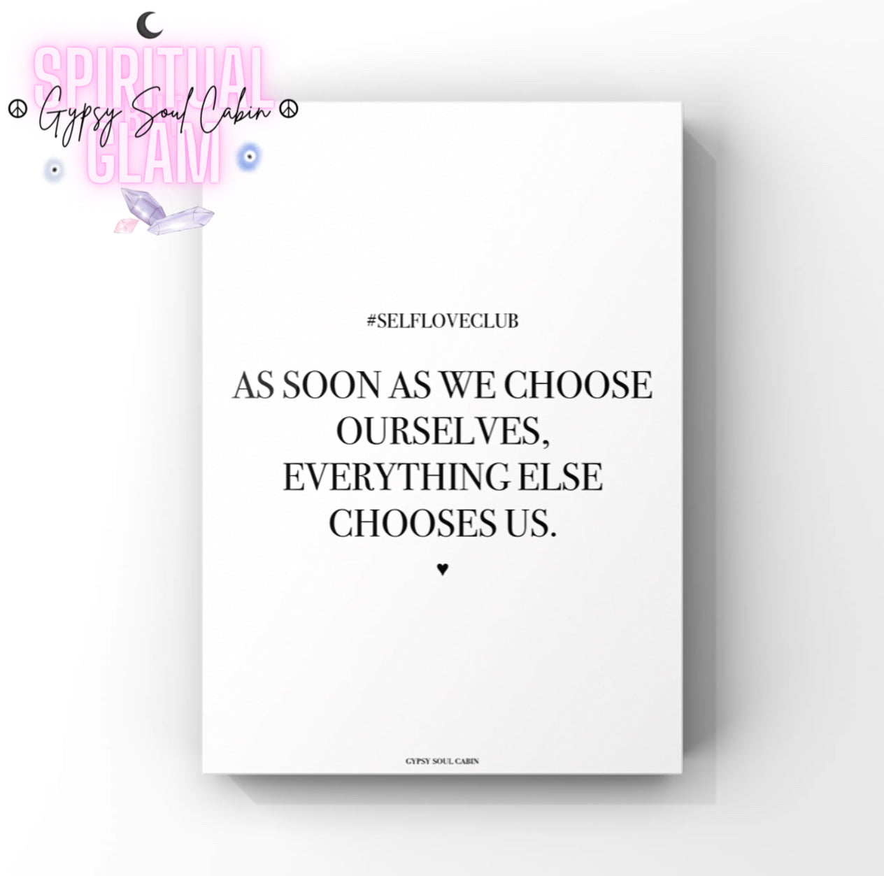 White poster with motivational quote on a white background.