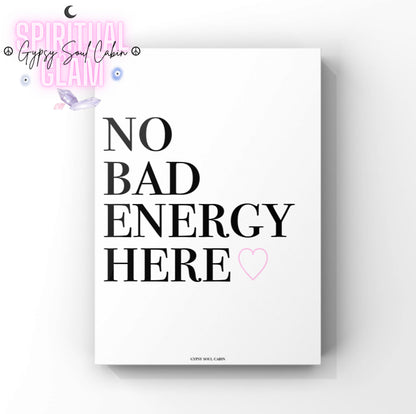 Minimalist A4 typographic wall art print featuring bold black stacked serif text reading NO BAD ENERGY HERE, paired with a small centred soft pink outline heart graphic.