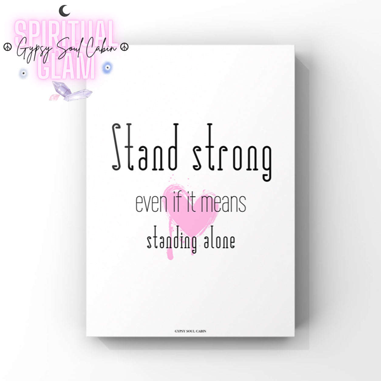 Minimalist A4 black and white typography print featuring the empowering quote Stand
Strong Even If It Means Standing Alone over a light pink watercolour heart accent.